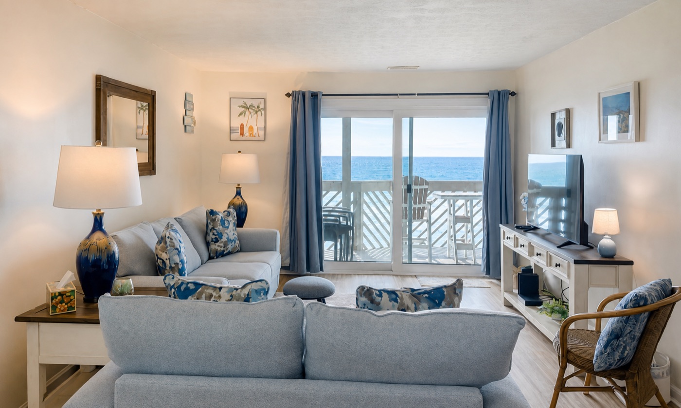 Living room with glass doors opening toward the Atlantic